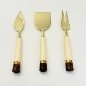 Ensemble de couteaux à fromage en acier inoxydable très vendus avec manche rond en résine blanche pour la maison, l'hôtel et le restaurant à prix avantageux - Product Image 1