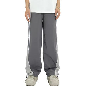 กางเกงวินด์เบรกเกอร์ผู้ชายลายโลโก้แบบกำหนดเอง กางเกงวอร์มทรงบานสไตล์วินเทจพร้อมแถบโค้งตรง กางเกงแทร็คไนลอน 2026 - Product Image 2