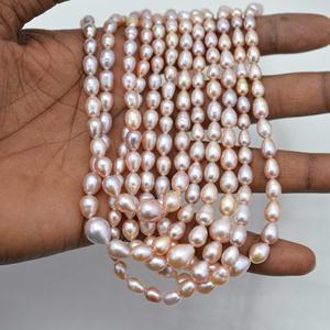 Perles de pierre de perle d'eau douce rose naturelle de 6 mm 9 mm, forme de riz lisse, nacre, provenant du fabricant, meilleurs bijoux faits à la main - Product Image 1
