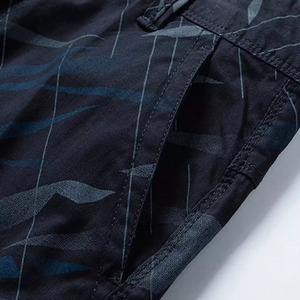 กางเกงขาสั้นคาร์โก้ผู้ชายแบบรักษ์โลก ผ้าเนื้อเดียว ใส่สบายสำหรับฤดูร้อน มีเชือกผูกเอว ยางยืดที่เอว มีกระเป๋าหลายช่อง รับผลิตแบบ OEM และปรับแต่งได้ - Product Image 3