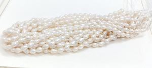 Perlas de agua dulce barrocas blancas de calidad AAA, forma de lágrima de 6*10 mm, perlas naturales para la fabricación de joyería a precio de mayorista. - Product Image 2