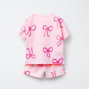 Conjunto de 2 piezas con estampado de lazo rosa para niñas, camiseta de manga corta y pantalones cortos, traje de verano, ropa informal de algodón con cuello redondo - Product Image 1