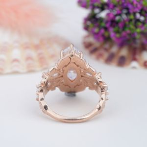 Ensemble de bagues de fiançailles en argent sterling 925 avec moissanite taille marquise romantique et alliance plaquée or rose à motif de rose 3D - Product Image 4