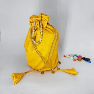 Sac à main rond en dentelle perlée de créateur avec fond en dentelle Sikka Zumka, accessoires de mode jaunes, sacs Potli - Product Image 1