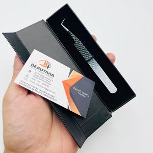 Pinzas de extensión de pestañas con purpurina de dos tonos de acero inoxidable con empuñadura de diamante de 90 grados personalizadas - Product Image 1