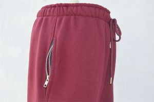 Pantalones de salón acanalados para mujer, color burdeos, de pierna ancha, suaves y elásticos, con etiqueta personalizada, OEM ODM, de forro polar con estampado animal y cintura con cordón. - Product Image 4