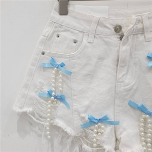 Nouvelle Collection Été : Short en jean délavé taille haute coupe ample pour femme, style vintage doux, avec nœud et pompon, style coréen mignon et décontracté - Product Image 6