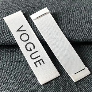 Étiquettes de vêtements en tissu biologique personnalisées, très demandées, technique de tissage avec texte ou logo personnalisé pour T-shirts et étiquettes de vêtements - Product Image 3