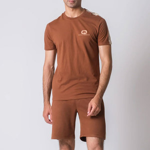 Conjunto de camiseta y pantalones cortos de moda urbana para verano, tela suave y cómoda para uso casual y estilo diario. - Product Image 1