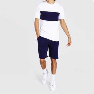 Ensemble décontracté pour homme : T-shirt blanc à col rond avec blocs de couleur marine et short marine – Respirant et idéal pour l'été - Product Image 1
