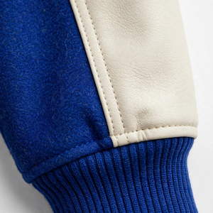 Veste universitaire bleue et blanche pour homme avec broderie de lion, fermeture à boutons pression, manches blanches, broderie de lion, style baseball - Product Image 5