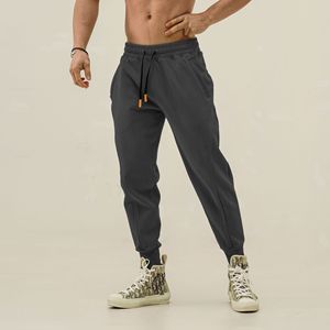 Pantalones Deportivos de Algodón Beige para Hombre, Ligeros, de Cintura Media, Lisos, con Cordón Elástico, Bolsillos Laterales, Estilo Casual, para Otoño - Product Image 3