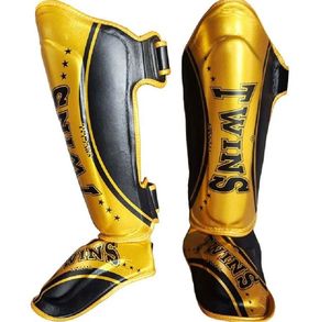 Protège-tibias de boxe en cuir Wolon Professional, protection renforcée, respirants, durables, fermeture auto-agrippante - Product Image 1