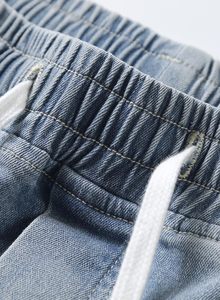 Pantalon cargo en jean délavé pour homme, taille mi-haute, coupe ample, en coton, style décontracté, pour le printemps - Product Image 4