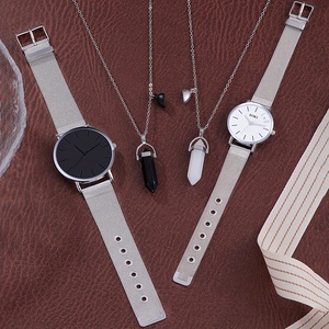 NW1476 Couple Black and White Round Dial Stainless Steel Quartz Wrist Watch - Product Image 3