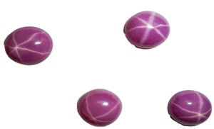 Rubis étoilé ovale 9x11 mm 4,5 carats, créé en laboratoire, poli, opaque, cabochon avec effet étoile à 6 branches pour la fabrication de bijoux - Product Image 5