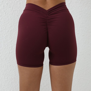 Shorts de yoga et de fitness pour femmes, taille haute, respirants, effet délavé, coupe ajustée, avec décolleté en V profond et effet froncé push-up fessier, vente en gros personnalisée - Product Image 5