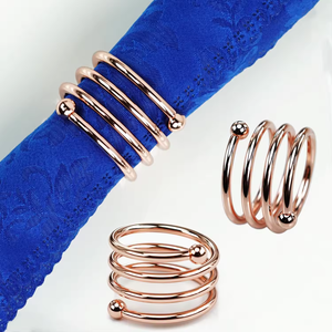Anillos de servilleta de metal antiguos que evitan pliegues desordenados y mantienen una presentación impecable y elegante durante toda la comida. - Product Image 1