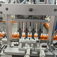 Machine d'assemblage automatique de tubes de rouge à lèvres QFW PLC, haute efficacité, capacité de 3600 pièces/heure, ligne d'assemblage plastique automatique