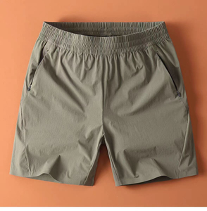 Shorts Bermuda pour homme à séchage rapide avec poches zippées, taille élastique, couleur unie, vêtements décontractés pour l'extérieur, gris - Product Image 1