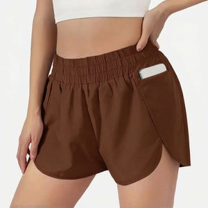 Pantalones cortos deportivos de cintura alta elásticos color marrón con bolsillos, ajuste holgado para mujer, de secado rápido, tejido de punto. - Product Image 1