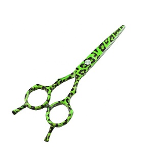 Ciseaux professionnels GMJ-01 en acier inoxydable, 5,5 pouces, motif léopard jaune, nouvelle conception tendance, pour coiffeur, gaucher, à dents plates et affûtées - Product Image 1