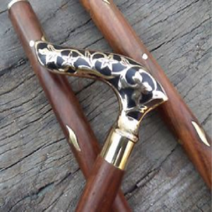 This luxury <b>white</b> walking stick features an ornate gold knob handle with decorative <b>hanging</b> chains available at wholesale prices - Product Image 3