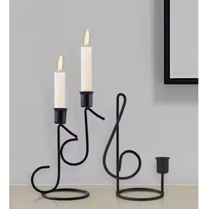 Metal candle holder enhances the ambiance of any room with warm and inviting lighting - Product Image 3