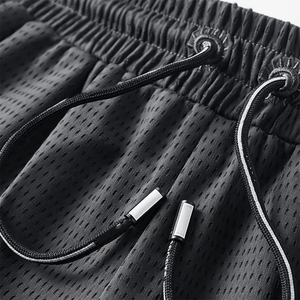 Shorts de sport pour homme en maille unie noire, coupe ample, longueur genou, pour l'été, jogging, course à pied, avec poche zippée, respirant - Product Image 4