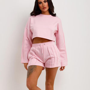 ชุดเซ็ตเสื้อครอปและกางเกงขาสั้นสีชมพูแบบใหม่ล่าสุดสำหรับผู้หญิง ดีไซน์เสื้อฮู้ดมีตะเข็บตกแต่ง ชุดเซ็ต 2 ชิ้น - Product Image 1