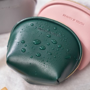 Custom Logo High-End PU Leather <b>Mini</b> Oval Storage <b>Bag</b> Zipper Fashionable Modern Design for Jewelry <b>Gift</b> Packaging Portable - Product Image 2