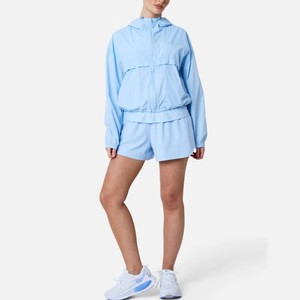 Ensemble de survêtement à capuche pour femme, manches longues, couleur unie, coupe ample avec poches latérales, polyester léger, style sportif d'été - Product Image 1