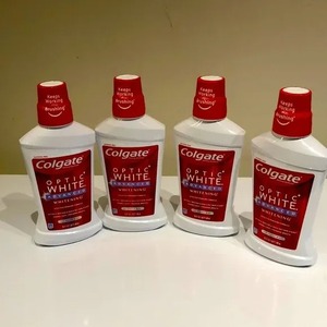 Enjuague bucal Colgate Optic White, poderoso blanqueador con eliminación de manchas y protección de frescura duradera. - Product Image 1