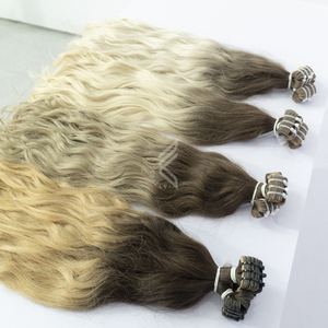 Cinta rizada en extensiones de cabello Extensiones de cabello humano al por mayor Precio más bajo de China - Product Image 1