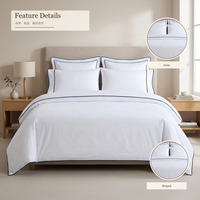 Ensemble de literie 4 pièces en coton blanc rayé 300 fils pour hôtel, housse de couette, drap et taies d'oreiller OEM pour chambre d'hôtes et complexe hôtelier