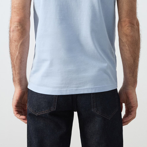 T-shirt en jersey pour homme, couleur unie, manches courtes, texture lisse, look contemporain / Col rond avec logo - Product Image 6