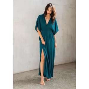 เดรสยาวแขนยาวครึ่งแขนสำหรับผู้หญิง ดีไซน์หรูหรา ผลิตจากผ้าฝ้ายธรรมชาติ 100% เป็นมิตรต่อสิ่งแวดล้อม เหมาะสำหรับใส่ในชีวิตประจำวัน มีจำหน่ายแบบสั่งซื้อจำนวนมาก - Product Image 4