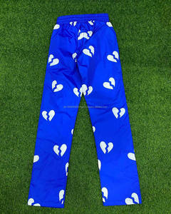 Pantalon de survêtement coupe-vent avec logo personnalisé pour hommes Pantalon de jogging haut en nylon léger à rayures Pantalon unisexe en velours côtelé en coton à jambes larges - Product Image 4