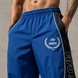 Pantalon de survêtement bleu pour homme avec bande latérale, taille élastique, séchage rapide, léger, décontracté, en polyester, pour l'été - Product Image 5