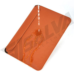 Funda Protectora para Portátil de Cuero Genuino Resistente al Agua, Estilo Ejecutivo, Color Naranja Sólido, Correa Ajustable, para 13-15 Pulgadas - Product Image 1
