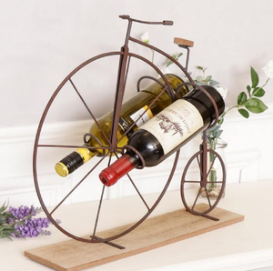 Wrought iron scrollwork single wine bottle holder stand <b>topped</b> with a decorative <b>butterfly</b>, available at wholesale prices. - Product Image 3