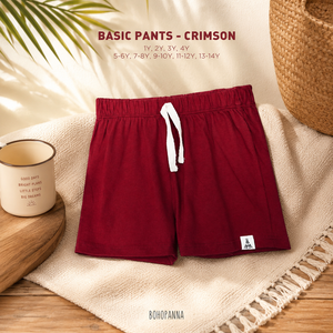 Pantalons en coton rouge vif basiques offrant une flexibilité fiable, un confort respirant et un style intemporel pour les enfants actifs au quotidien. - Product Image 1