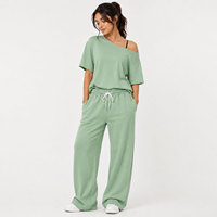 Ensemble pantalon et t-shirt asymétrique pour femme, en tissu uni délavé, taille élastique, tenue confortable pour le quotidien