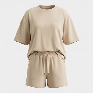 Ensemble décontracté en tricot pour femmes, 2 pièces, t-shirt à manches courtes et short au-dessus du genou, couleur unie, respirant, coupe ample, printemps été - Product Image 1