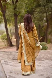 Nouvel ensemble de soirée de créateur : Sharara, Plazzo et Dupatta - Kurta Peplum en soie brodée couleur moutarde avec ensemble Sharara - Product Image 3