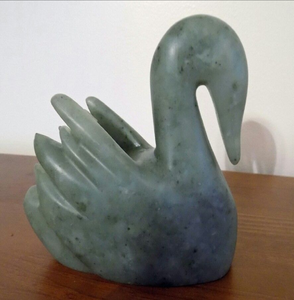 Graceful light blue ceramic swan figurine with open wings and elegant gold accents, available at wholesale prices. - Product Image 4