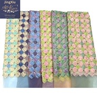 Tela de malla bordada con textura geométrica para la confección de vestidos modestos, abayas, caftanes y prendas de moda.