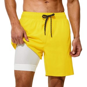 Shorts pour hommes jaunes unis à séchage rapide avec cordon de serrage et doublure intérieure en mesh, pour la plage et les loisirs - Product Image 1