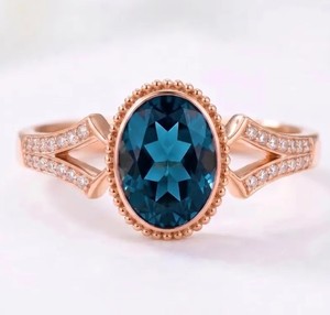 Elegante Anillo Ovalado con Topacio Azul Londres, Chapado en Oro Rosa de 18K, Anillos de Promesa con Halo de Diamantes, Joyería Fina para Mujer, Venta al Por Mayor - Product Image 1