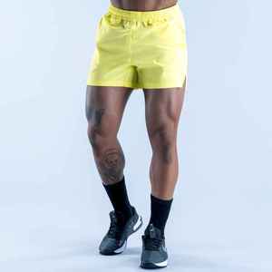 Shorts décontractés tricotés pour hommes, jaunes, couleur unie, taille élastique, avec poches, séchage rapide, taille mi-haute, OEM ODM personnalisé - Product Image 1
